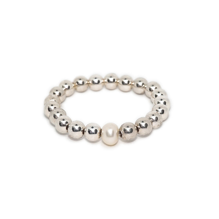 Anillo de bolitas con perla