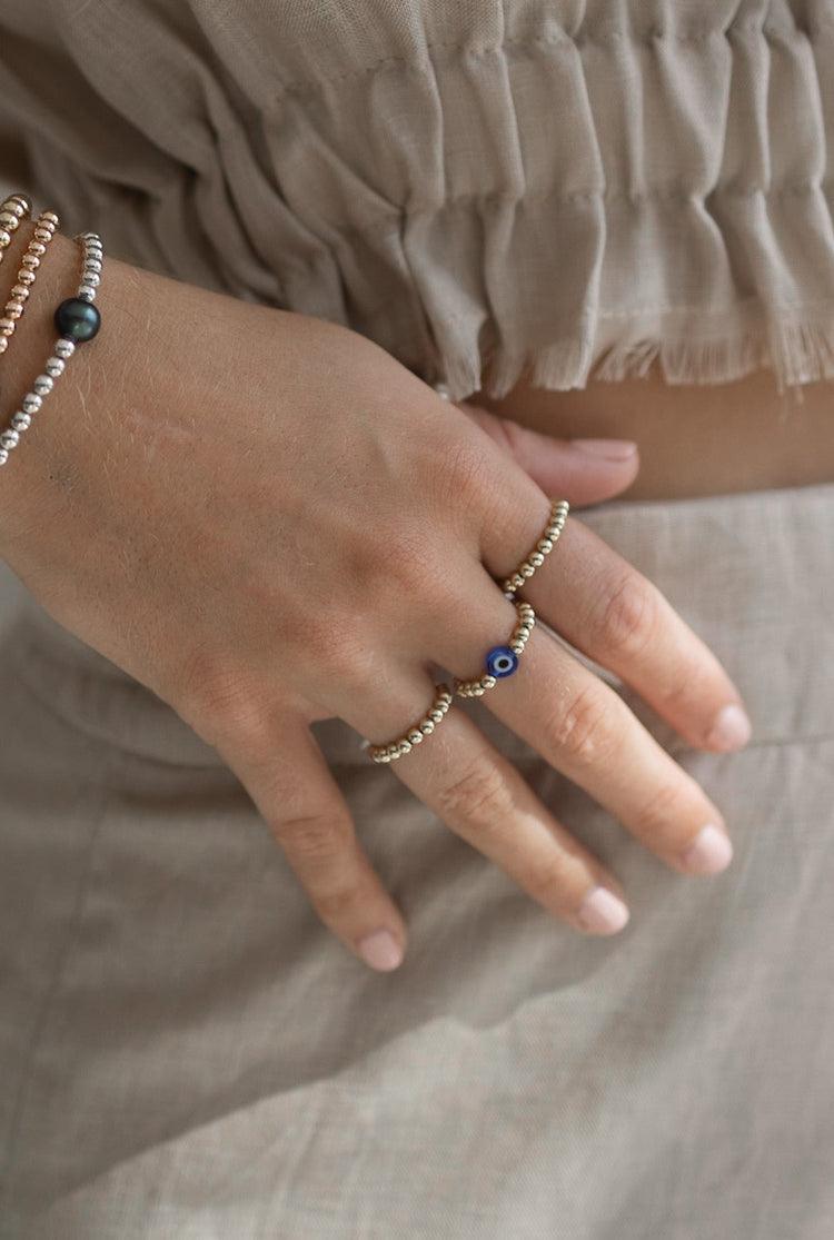 Anillo de bolitas con ojito