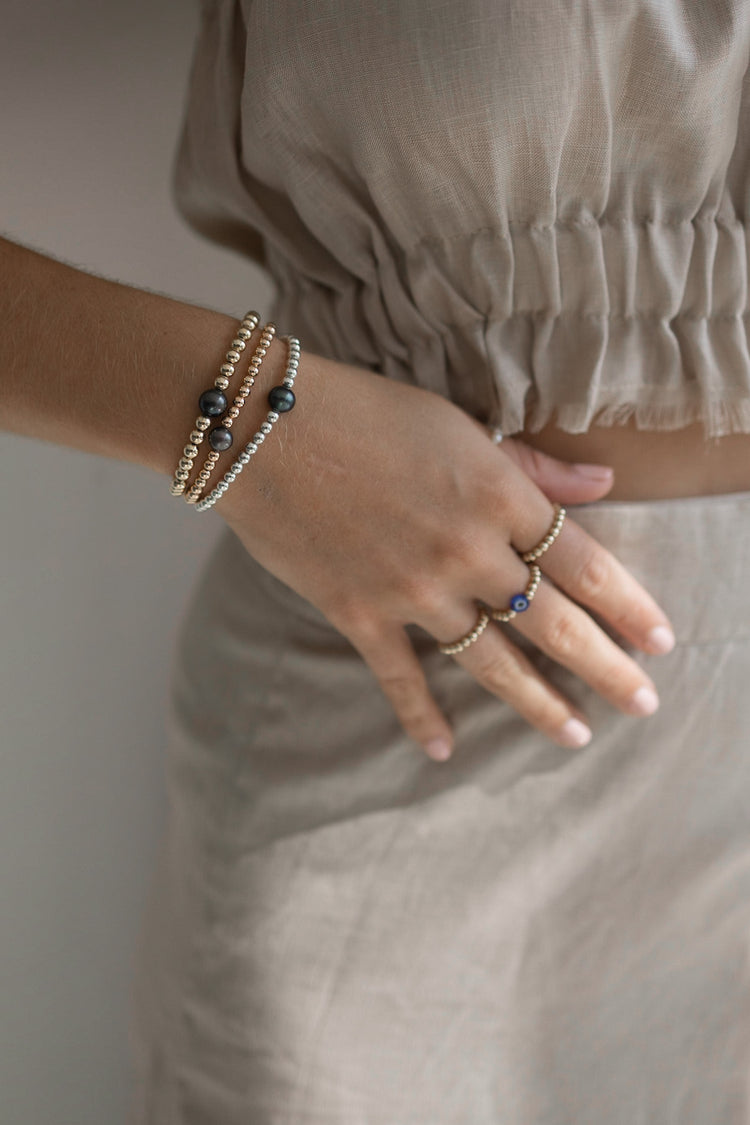 Pulsera de bolita con perla