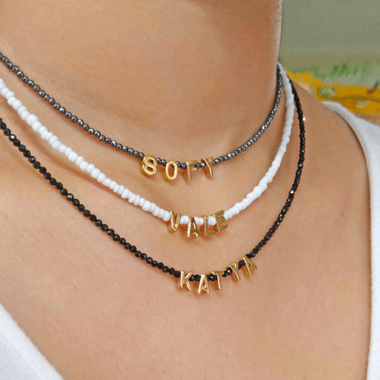 Collar con chaquira y letras de acero - Isa Maraf Jewelry
